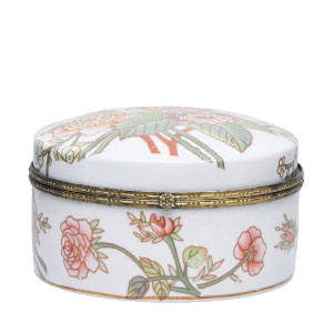 Cajita joyero de cerámica blanca con detalles en dorado.