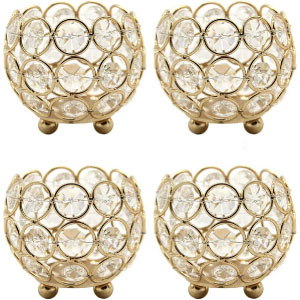 Juego de candelabros dorados con cristal de tamaño pequeño para sobremesa.