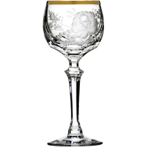 Copa de lujo de cristal tallado trasparente y filo de oro.