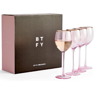 Juego de copas de agua o vino de cristal rosa y borde dorado.