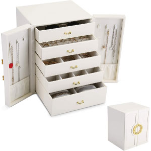 Caja organizador de joyas en blanco y dorado.