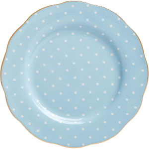 Plato de postre azul y dorado de cerámica.