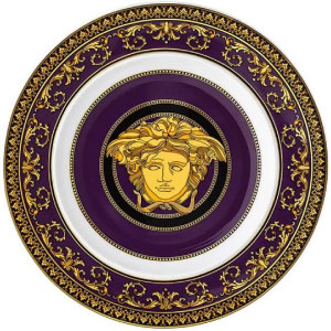Plato pequeño blanco con dorado.