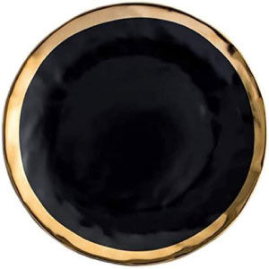 Platillo pequeño de aperitivo o postre, en negro y dorados de porcelana.