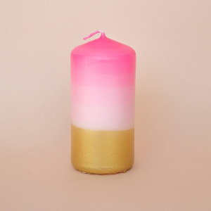 Velas de color dorado y rosa modernas.
