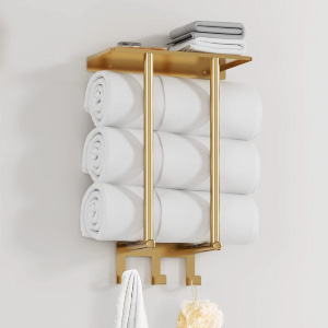 Perchero y toallero de baño dorado de pared.